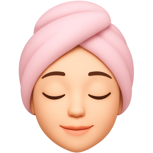 Clean white girl with her eyes shut having a light pink towel on her head and have her eyes shut closed and look peaceful