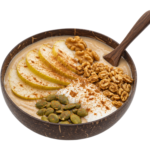 Spiced Pear Vanilla Bowl Smoothie Bowl in a Coconut Shell-Style Bowl With a Wooden Spoon with Sliced Pears, Walnuts, Granola, Protein Yogurt and Pumpkin Seeds with Cinnamon on Top