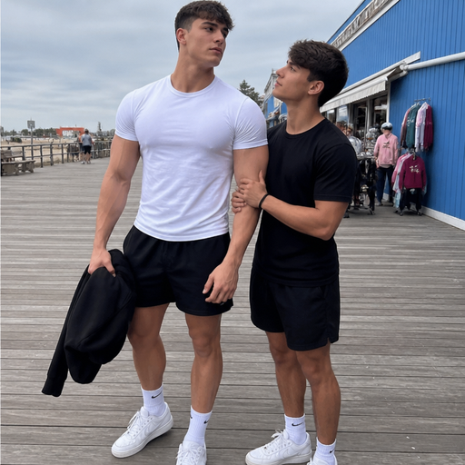 A Real life Full Body Image of a 6’3 Big and Hunky and Buff and Huge pecs that show through the Shirt and Biceps at huge that stretch the sleeves American White skinned Teenage Jock with a BASIC and ROUND looking face and Low taper fade with Dark Brown hair and brown eyes and Big Arms and Big Pecs with a Tall Grotesque Bodybuilding body. And his 5’9 boyfriend is holding his arm.