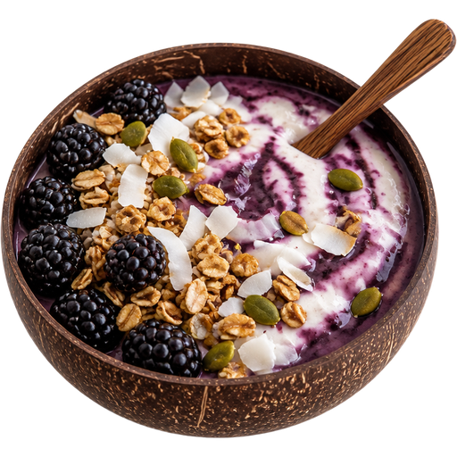 Blackberry Vanilla Crunch Smoothie Bowl in a Coconut Shell-Style Bowl With a Wooden Spoon with Vanilla Yogurt Swirled into it, Blackberries, Granola, Pumpkin Seeds and Coconut Flakes on Top