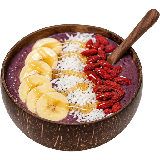 Smoothie Bowl in a Coconut Shell-Style Bowl With a Wooden Spoon with Sliced Bananas, Shredded Coconut, Dried Goji Berries, and Honey Drizzled on Top