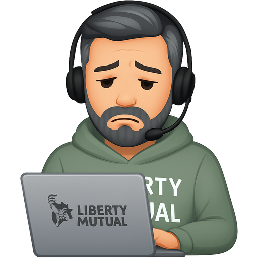Man with black and grey hair and beard working on work laptop feeling defeated wearing a sage color hoodie that says liberty mutual he’s also wearing a headphone microphone