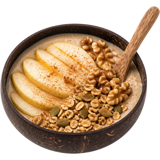 Spiced Pear Vanilla Bowl Smoothie Bowl in a Coconut Shell-Style Bowl With a Wooden Spoon with Sliced Pears, Walnuts, Granola and Pumpkin Seeds with Cinnamon on Top