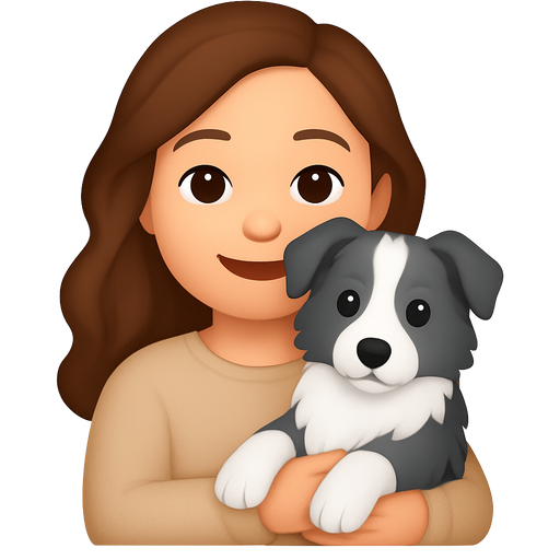 An white girl with long brown slightly curly hair and beige sweater holding a silver border collie puppy